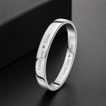 Vlakke zilveren bangle van 10 mm met gravure