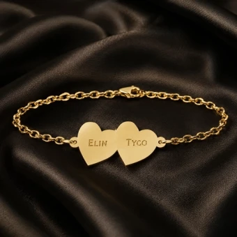 Gouden armband met twee harten en gravure