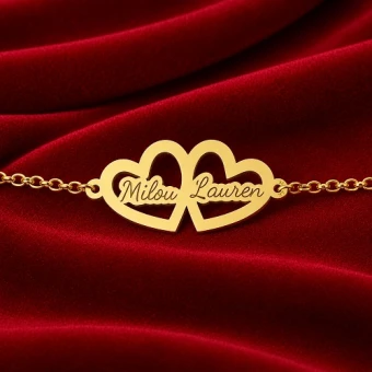 Gouden armband met twee hartjes en namen