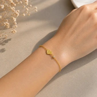 Gouden vingerafdruk armband met hartje en diamant