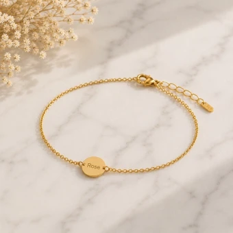 Gouden armband met ronde vingerafdrukbedel