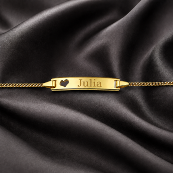 Gouden armbandje met uitgesneden hartje en gravure