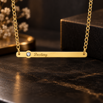 Gouden naamketting met Zirkonia en eigen naam