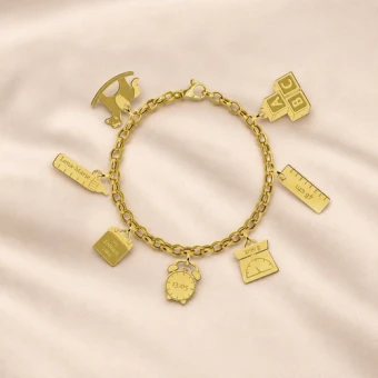 Gouden geboorte armband met losse bedels