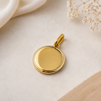 Ronde gouden hanger graveren
