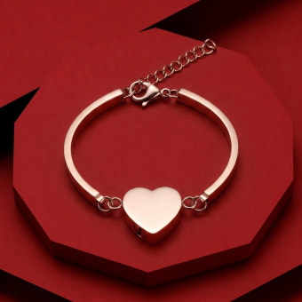 Rosékleurige RVS asarmband met hart en gravure