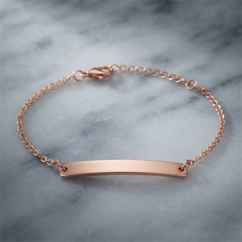 Roségoudkleurig stalen kinderarmbandje met gravure