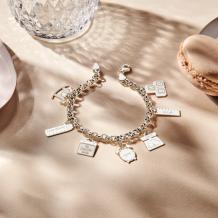 Zilveren geboorte armband met losse bedels sfeer