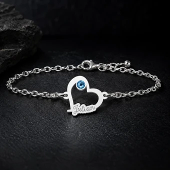 Zilveren hartjesarmband met steentje en gravure