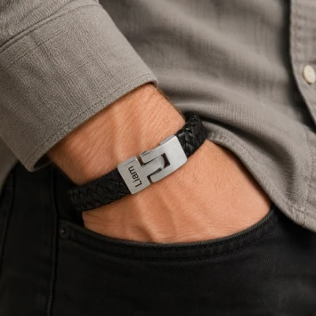 Bruine gevlochten leren asarmband met matte RVS sluiting