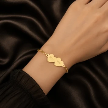 Gouden armband met twee harten