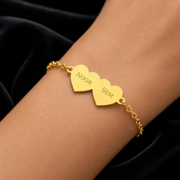 Gouden armband met twee hartjes
