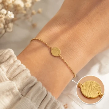 Gouden armband met ronde vingerafdrukbedel