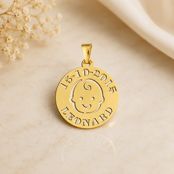 Gouden baby hanger krul met naam en datum