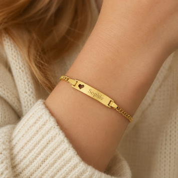 Gouden figaro armbandje met uitgesneden hartje