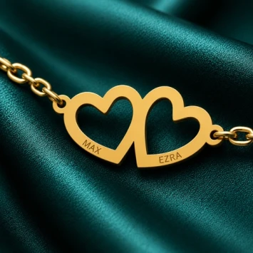 Gouden hartjes armband met twee namen