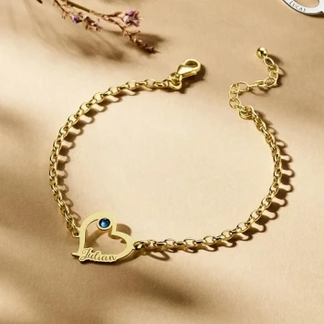 Gouden hartjesarmband met steentje