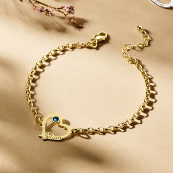 Gouden hartjesarmband met steentje