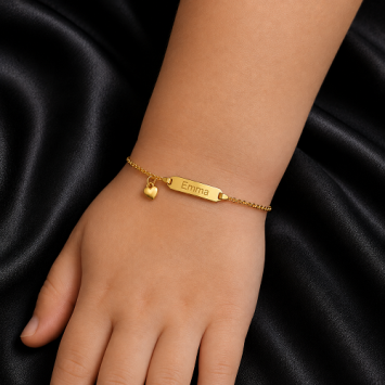 Gouden kinderarmbandje met plaatje en hartje