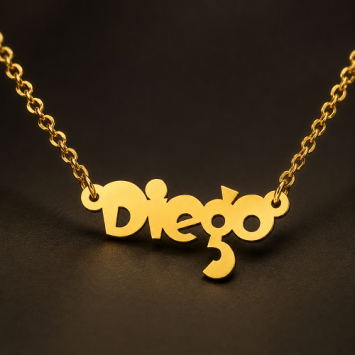 Gouden kindernaamketting met speels lettertype en eigen naam