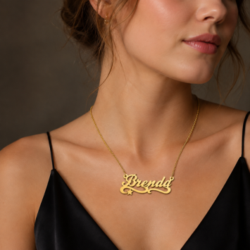 Gouden kindernaamketting met ster en sierlijke krullen
