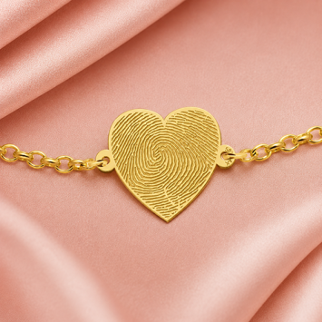 Gouden schakel armband met vingerafdruk op hartje