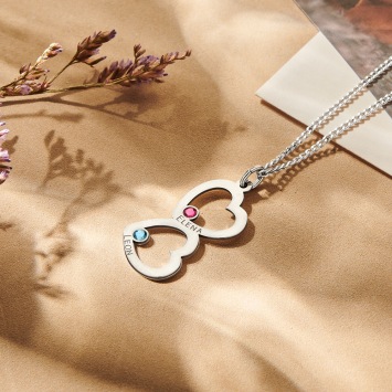 Zilveren familie hanger met twee harten en geboortesteen