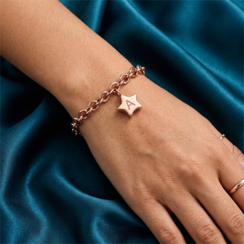 Rosé RVS as armband met ster bedel en schroefdopje