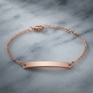 Roségoudkleurig stalen kinderarmbandje met gravure