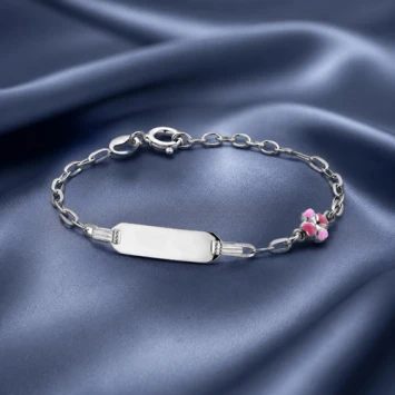 Zilveren kinderarmband met klavertje vier roze