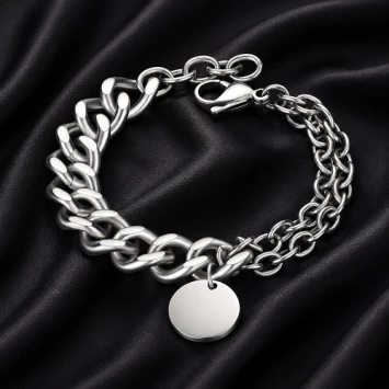 RVS armband met een enkele grove schakel en een dubbele smalle schakel met ronde bedel