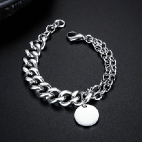 RVS armband met een enkele grove schakel en dubbele smalle schakel met ronde bedel