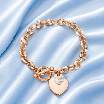 Rosé RVS armband met groot hart en klein hart met steentjes