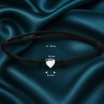 Gold plated baby armbandje met naam en uitgesneden hartje
