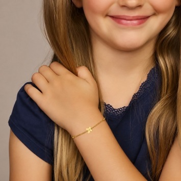 Vergulden kinderarmbandje met vlinder