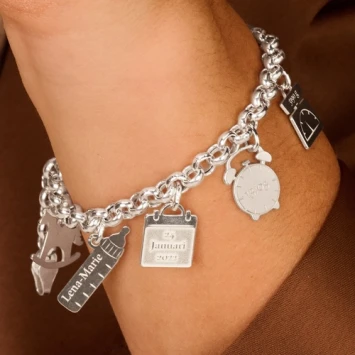 Zilveren geboorte armband met losse bedels