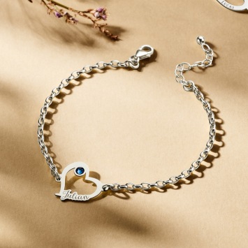 Zilveren hartjesarmband met steentje