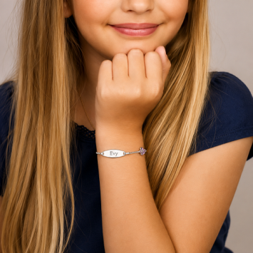 Zilveren kinderarmband met roze vlinder ovaal