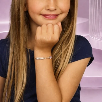 Zilveren kinderarmband met vlinder roze