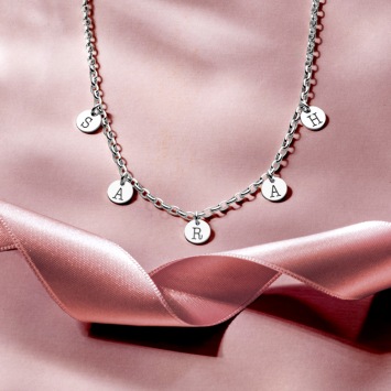 Zilveren naamketting met ronde letter bedels