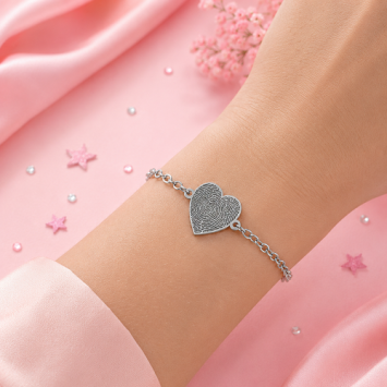 Zilveren armband met hartje en vingerafdruk